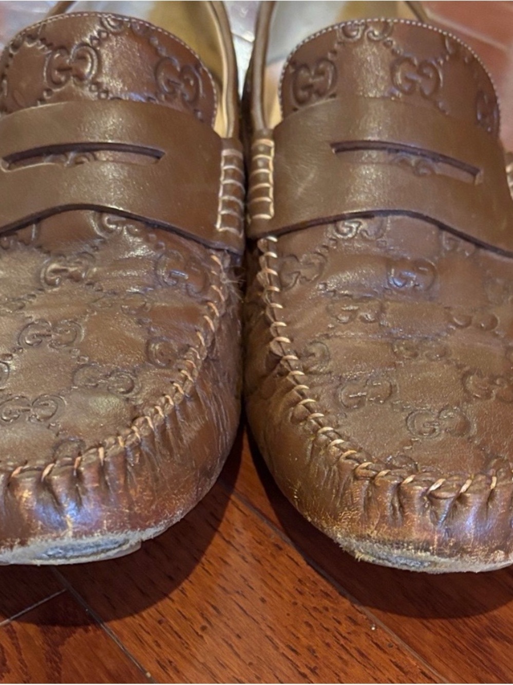 Gucci Brown Leather Embossed Penny Loafers